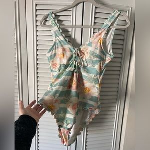 Swimsuit, one-piece, size 10. Floral, front ties.